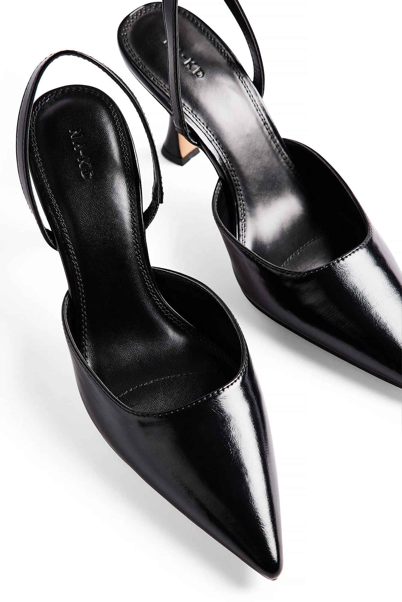 Schmale Sling-Pumps mit Sanduhrform