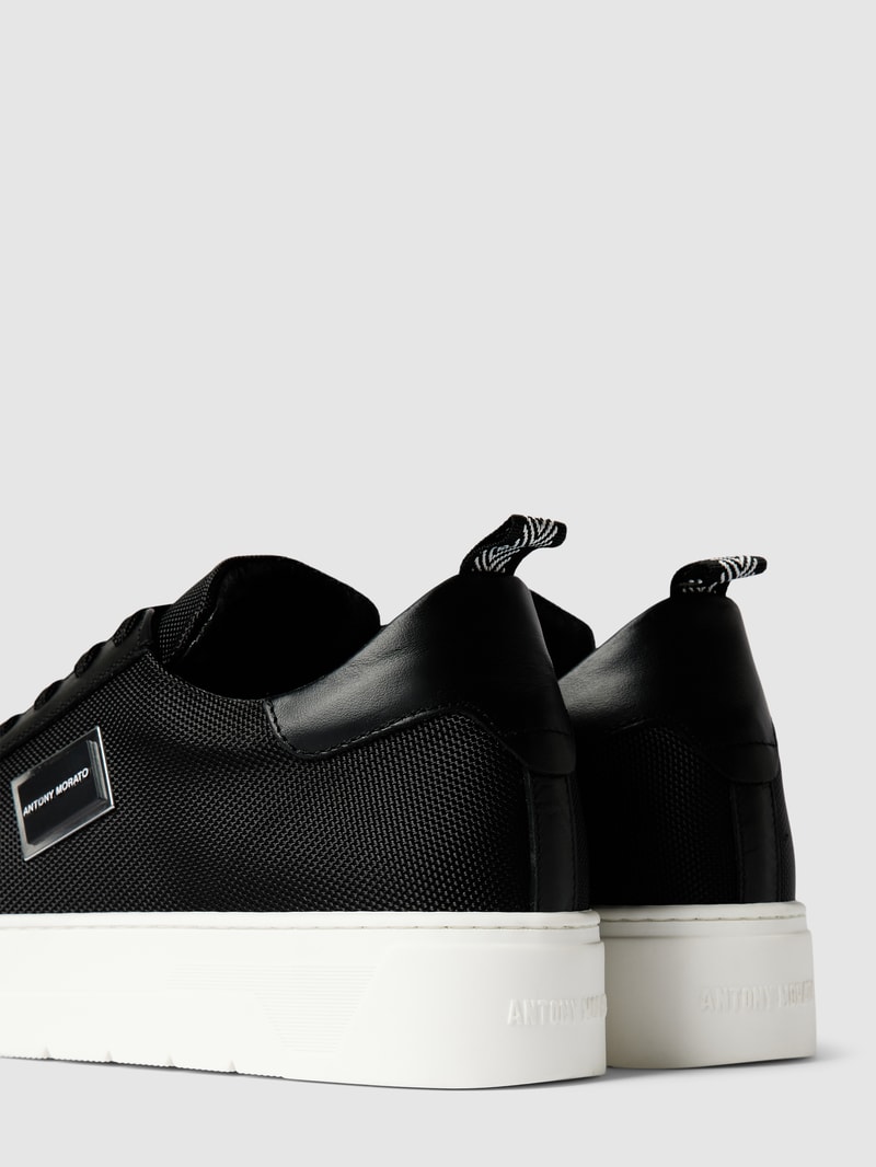 Sneaker mit Label-Details Modell 'PLAKETTE' in schwarz