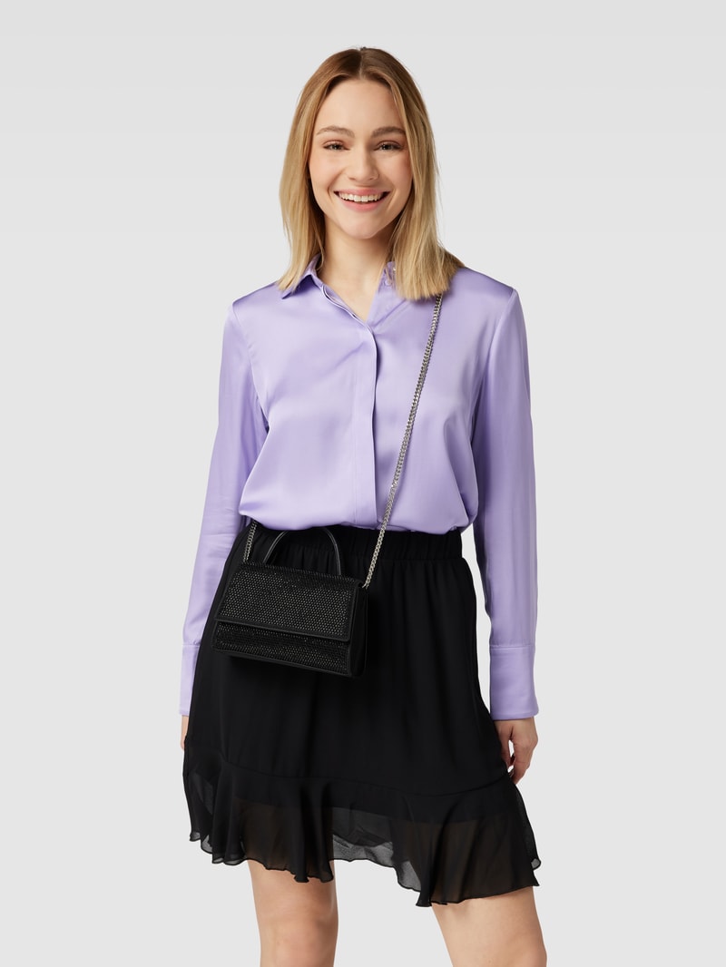 Handtasche mit Zierbesatz in schwarz
