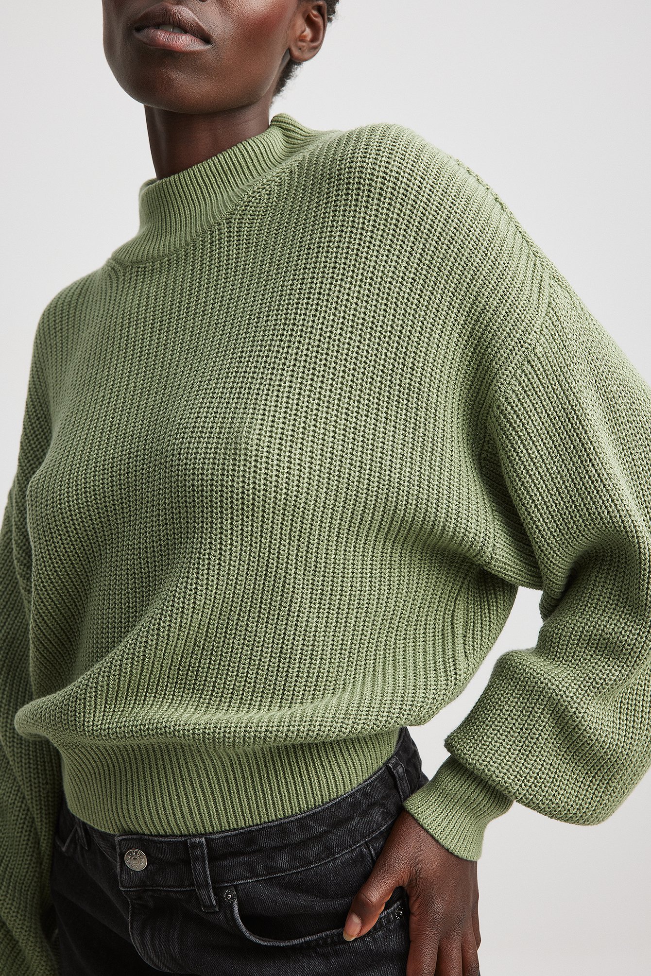 Strickpulli mit weiten Ärmeln