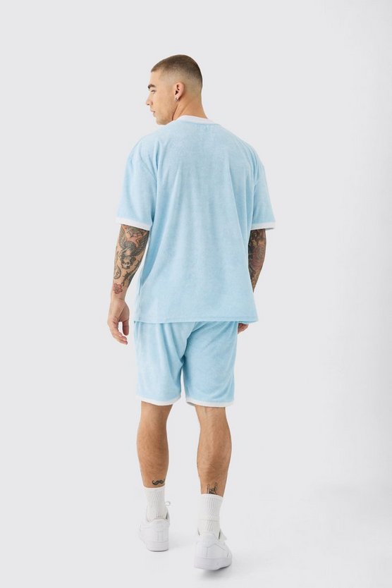 Lockere Frottee-Shorts mit Kontrast