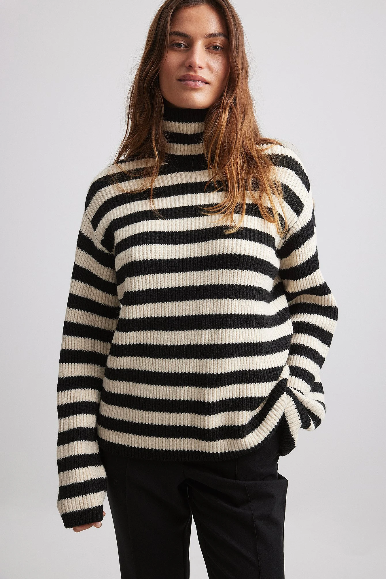 Gestrickter gestreifter Polo-Pullover