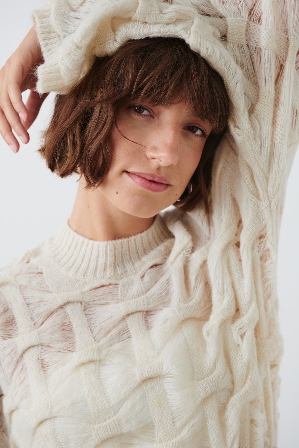 Open work knitted sweater