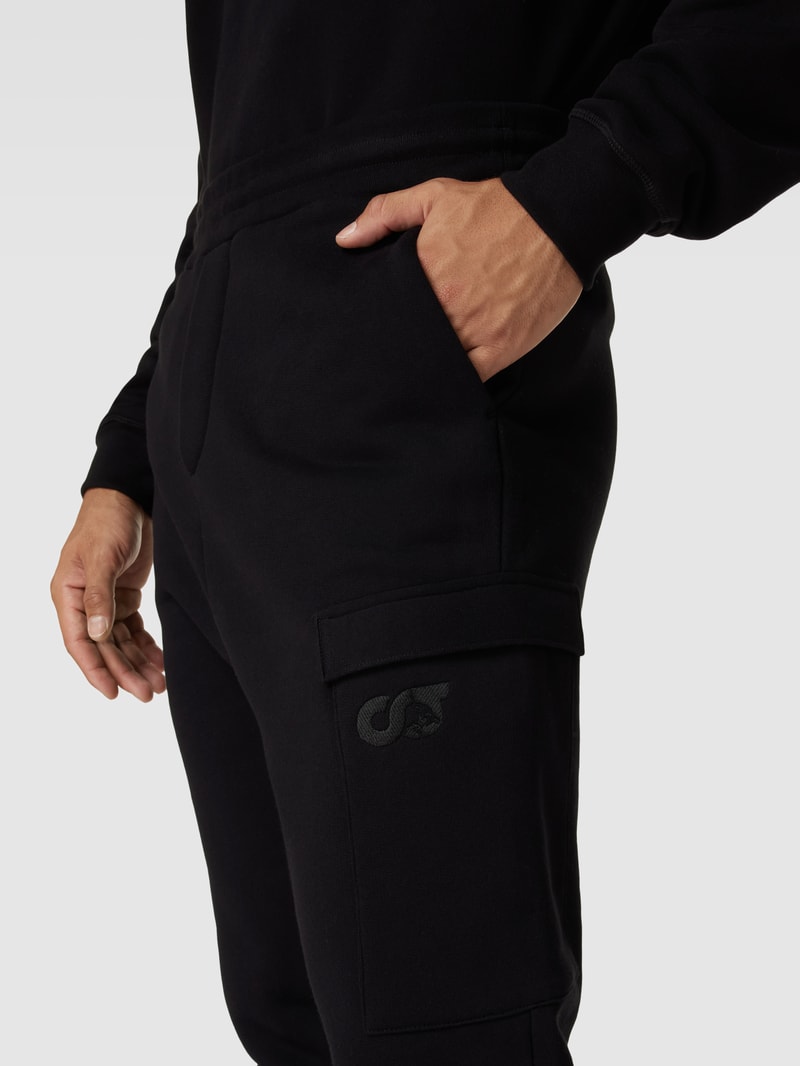 Sweatpants mit Cargotasche Modell 'PEOVA' in schwarz