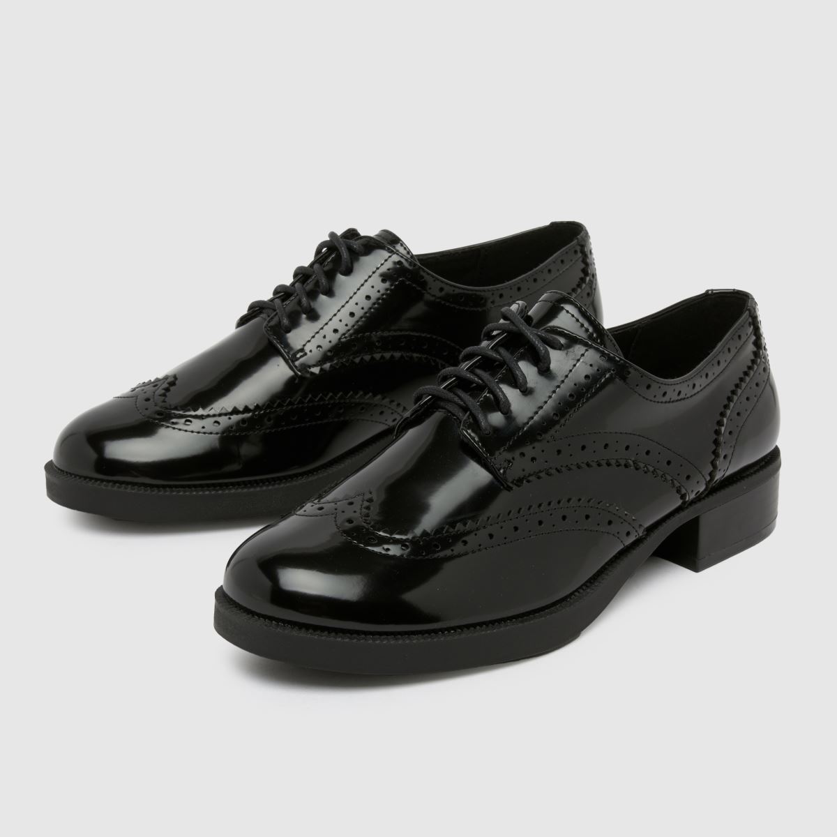 Schuh Lallie brogue lapos talpú cipők fekete színben