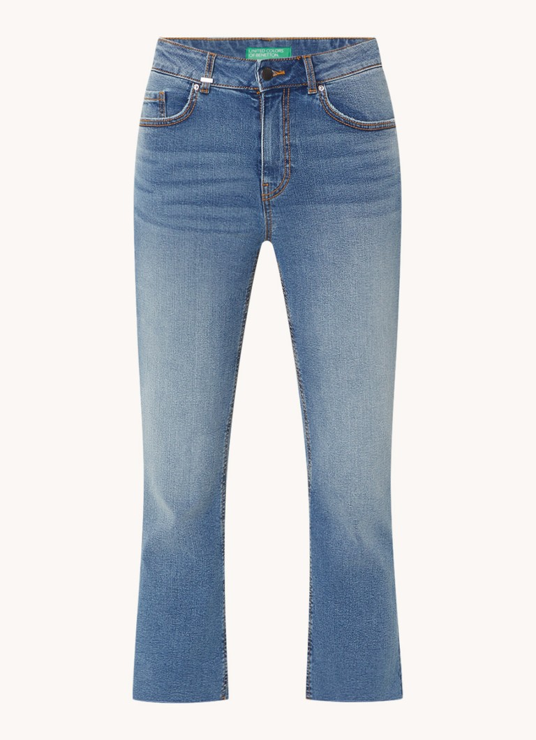 Jeans Benetton a vita media e taglio svasato, lavaggio scuro.