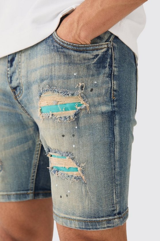 Skinny Stretch PU Jeansshorts mit Farbspritzern und Rissen