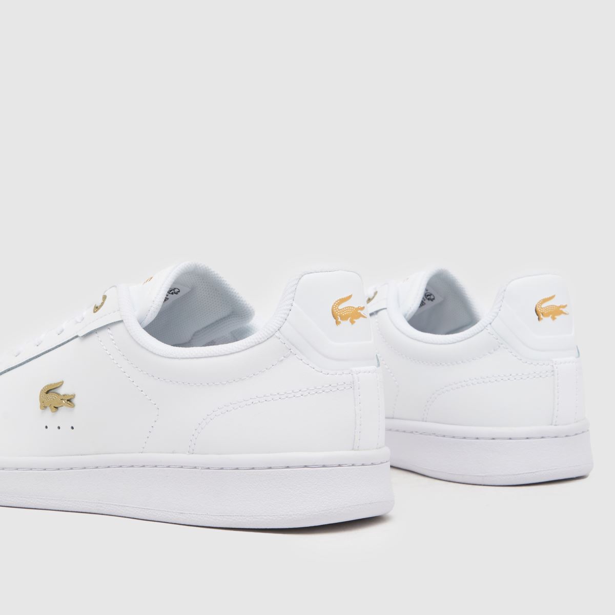 Lacoste Carnaby Pro sportcipők fehér és arany színben