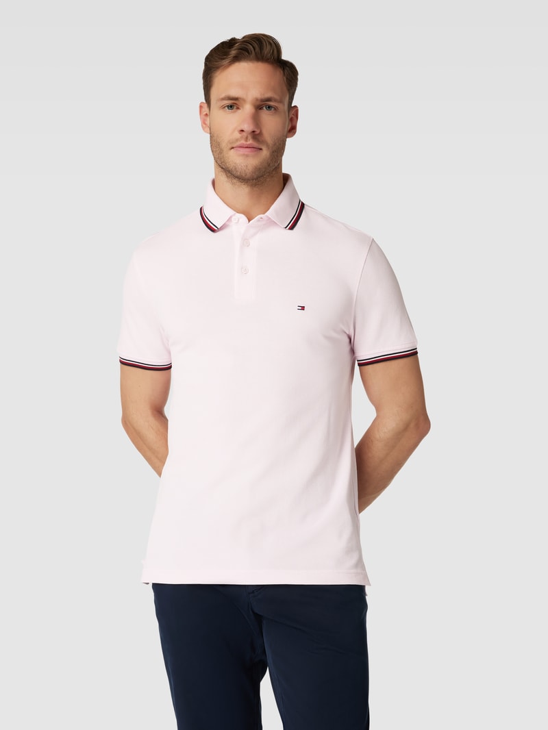 Poloshirt mit Kontraststreifen in koralle