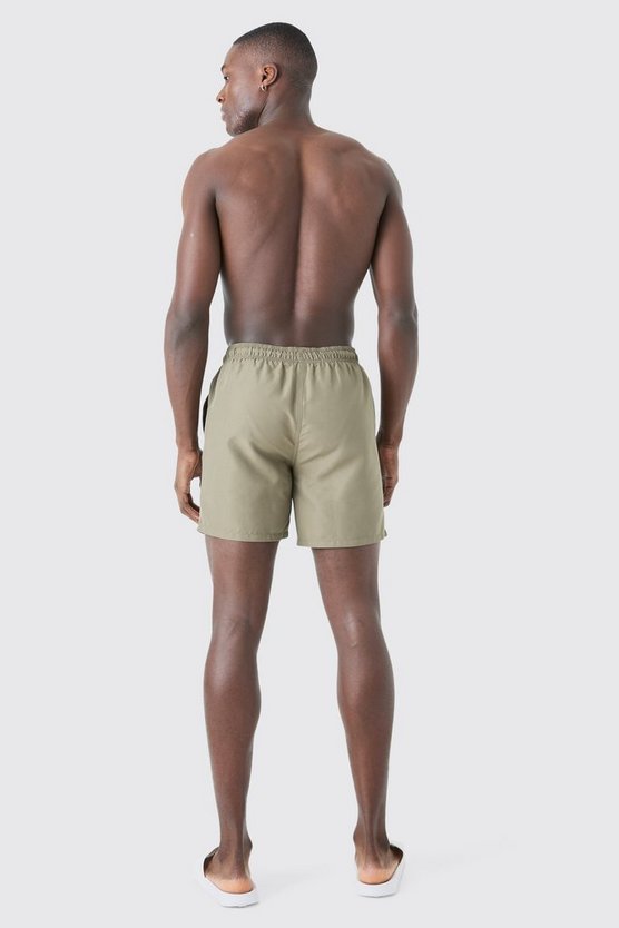 Man Signature mittellange Badehose