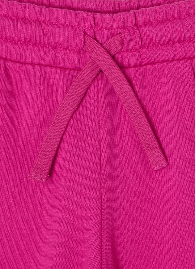 Pantaloni de trening Benetton conici cu logo brodat.