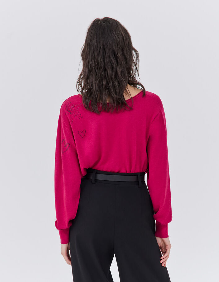 Pull rose en tricot à décor rock strass Femme