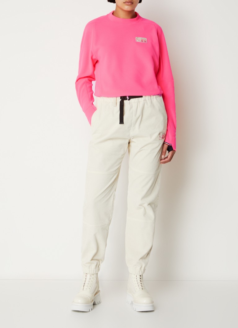 Pantaloni Moncler in velluto a coste, taglio affusolato, vita media, con patch logo.