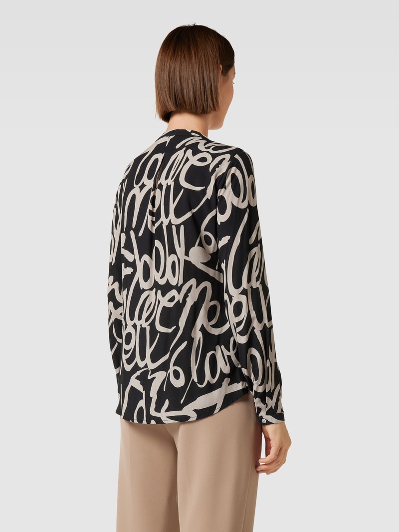 Blusenshirt mit Allover-Muster in schwarz