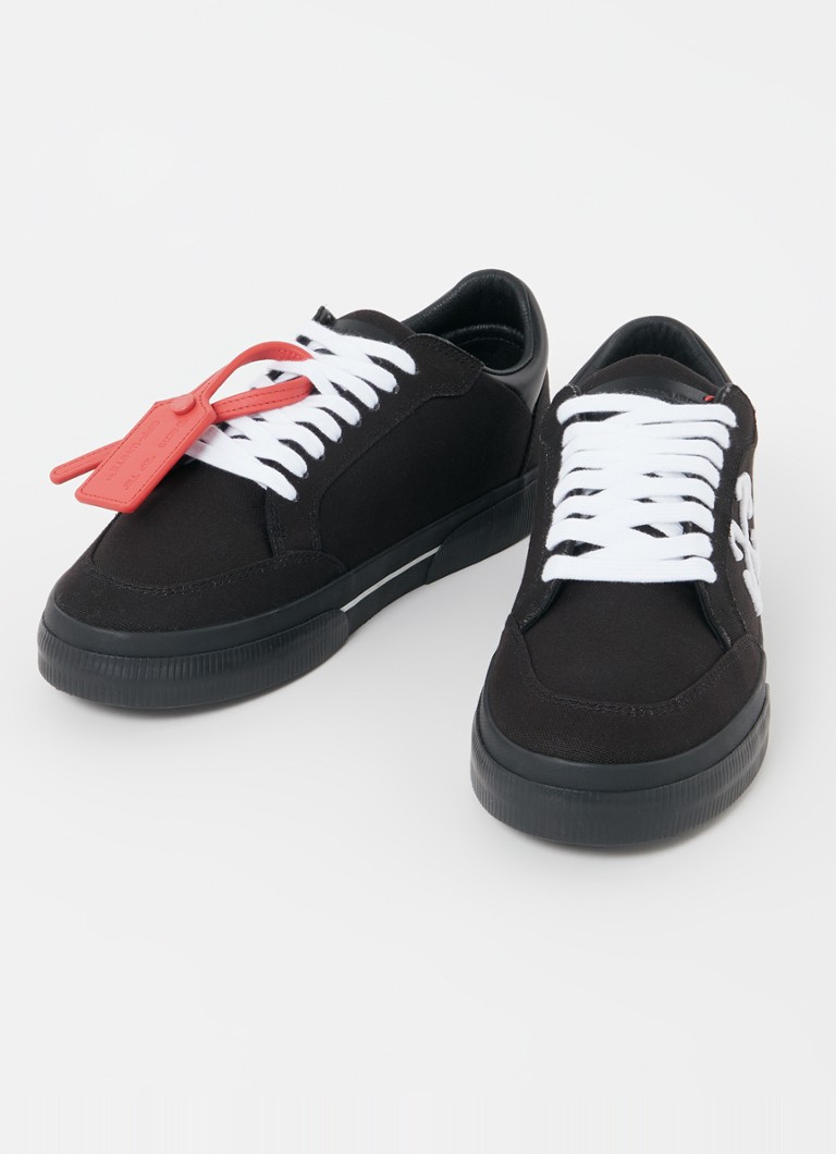 Niskie trampki Off-White wykonane z wulkanizowanego płótna ze skórzanymi detalami.