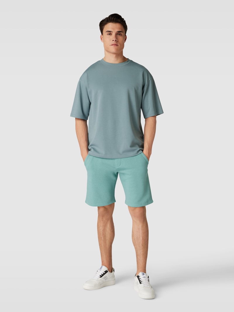 Sweatshorts mit französischen Eingrifftaschen in helltürkis