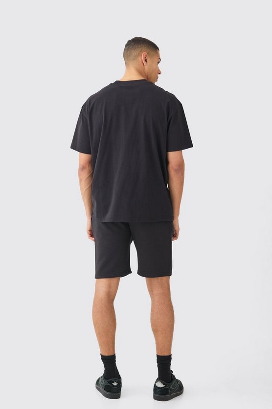 Man Signature Loose Fit Mid Length Shorts