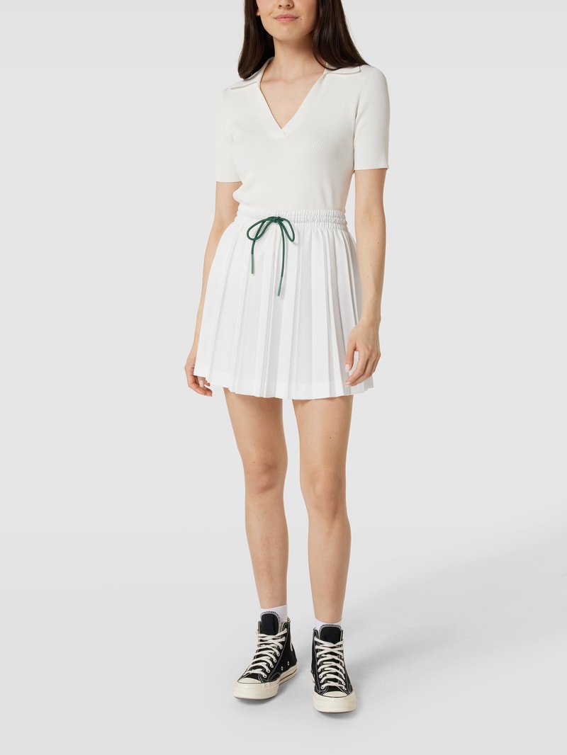 Faltenrock mit Logo-Stitching in offwhite