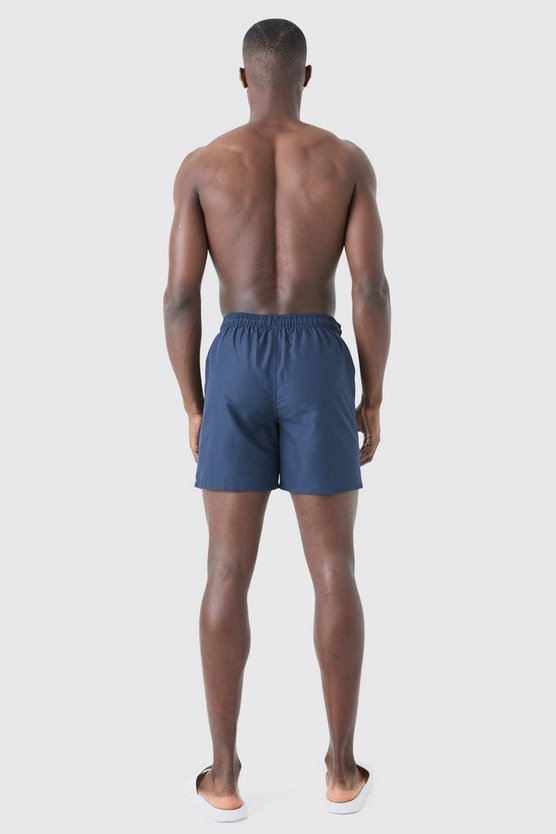 Man Signature mittellange Badehose
