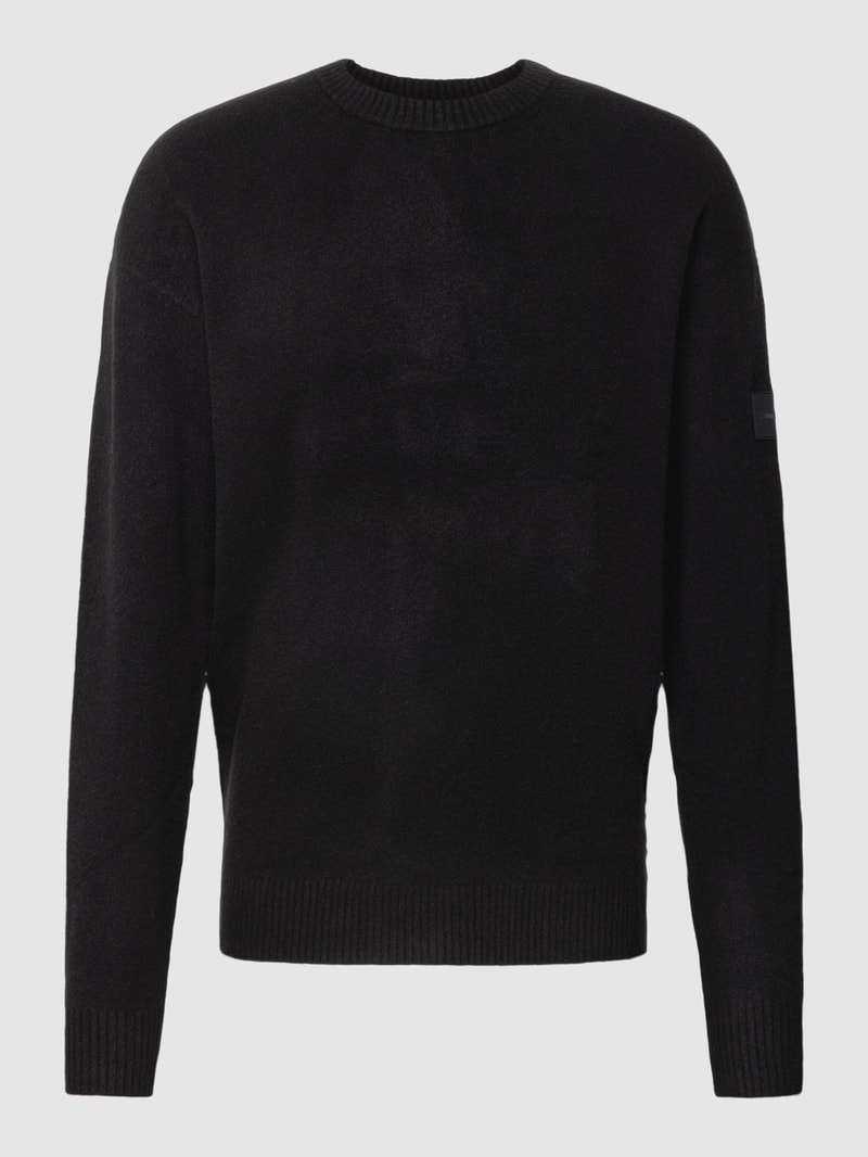 Strickpullover mit Label-Patch Modell 'LYCRA' in schwarz