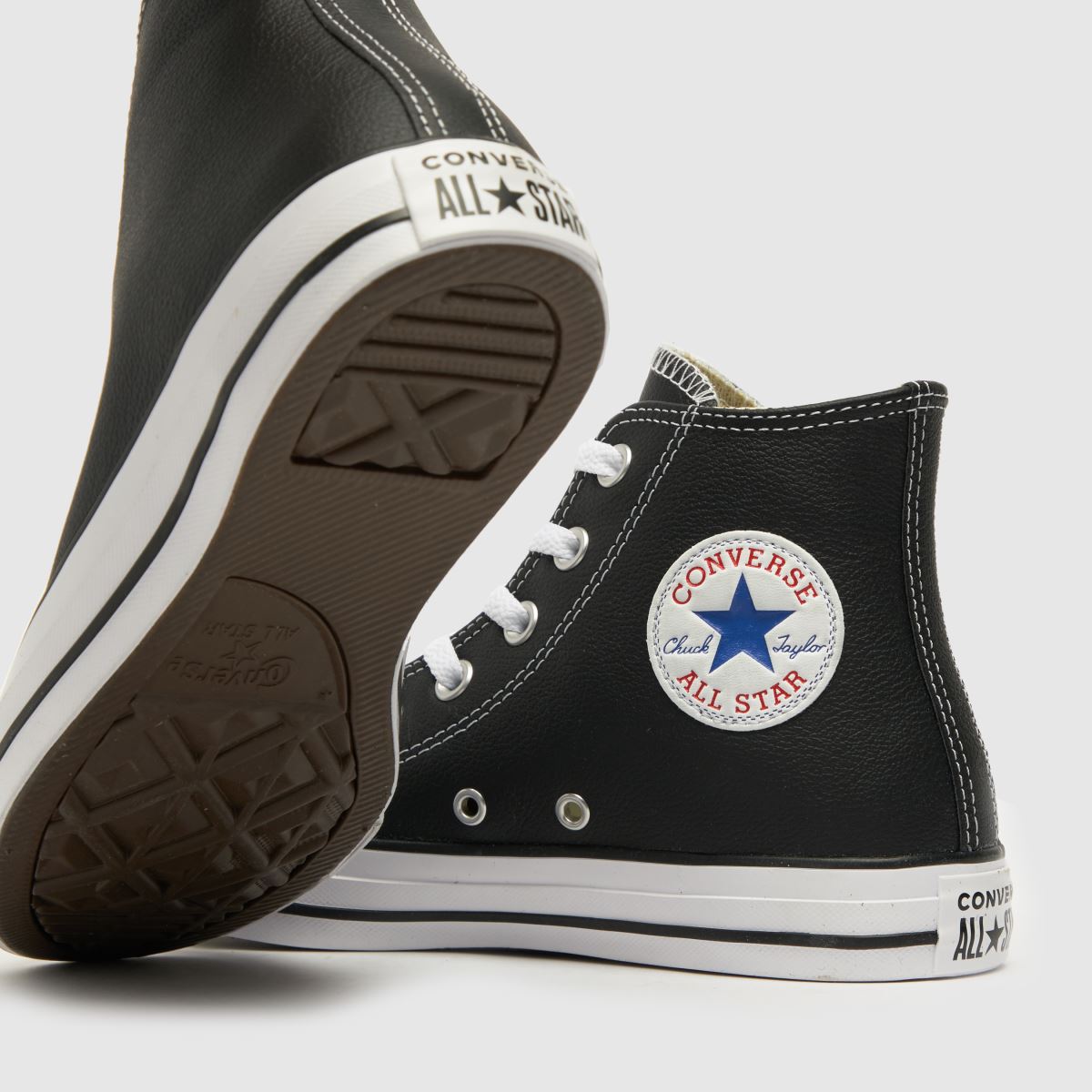 Converse All Star – Svarta och vita höga sneakers i läder