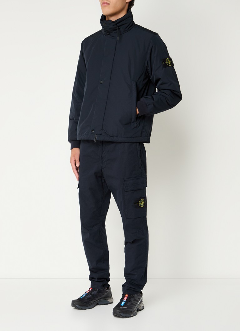 Μονωμένο μπουφάν Stone Island 43726 με πλαϊνές τσέπες και πτυσσόμενη κουκούλα