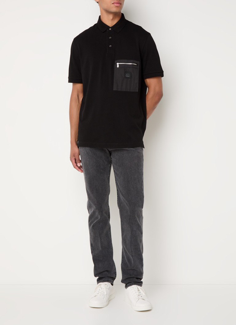Polo Armani Exchange de corte regular com bolso no peito e logotipo.