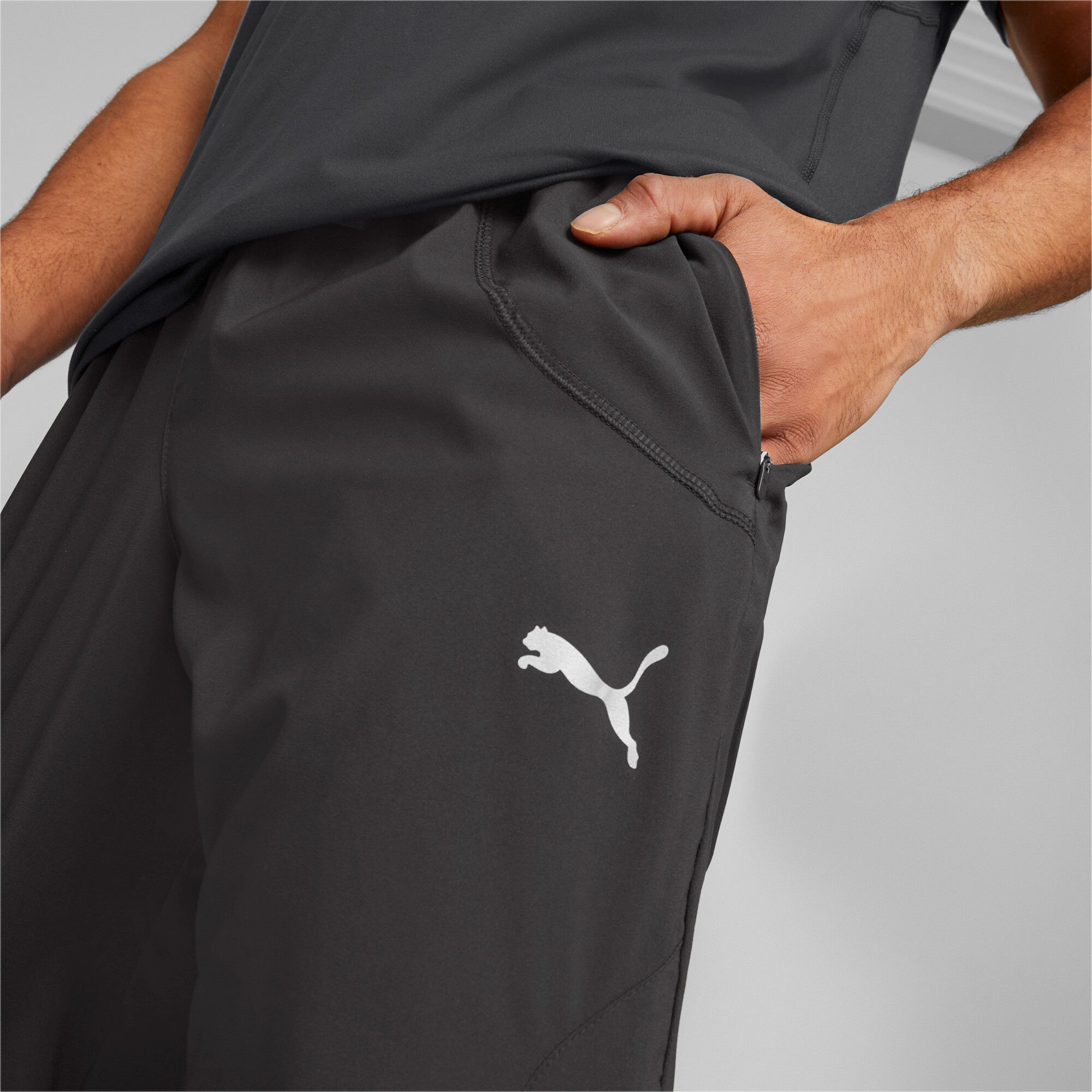 Run Tapered Woven Laufhose Herren - Schwarz