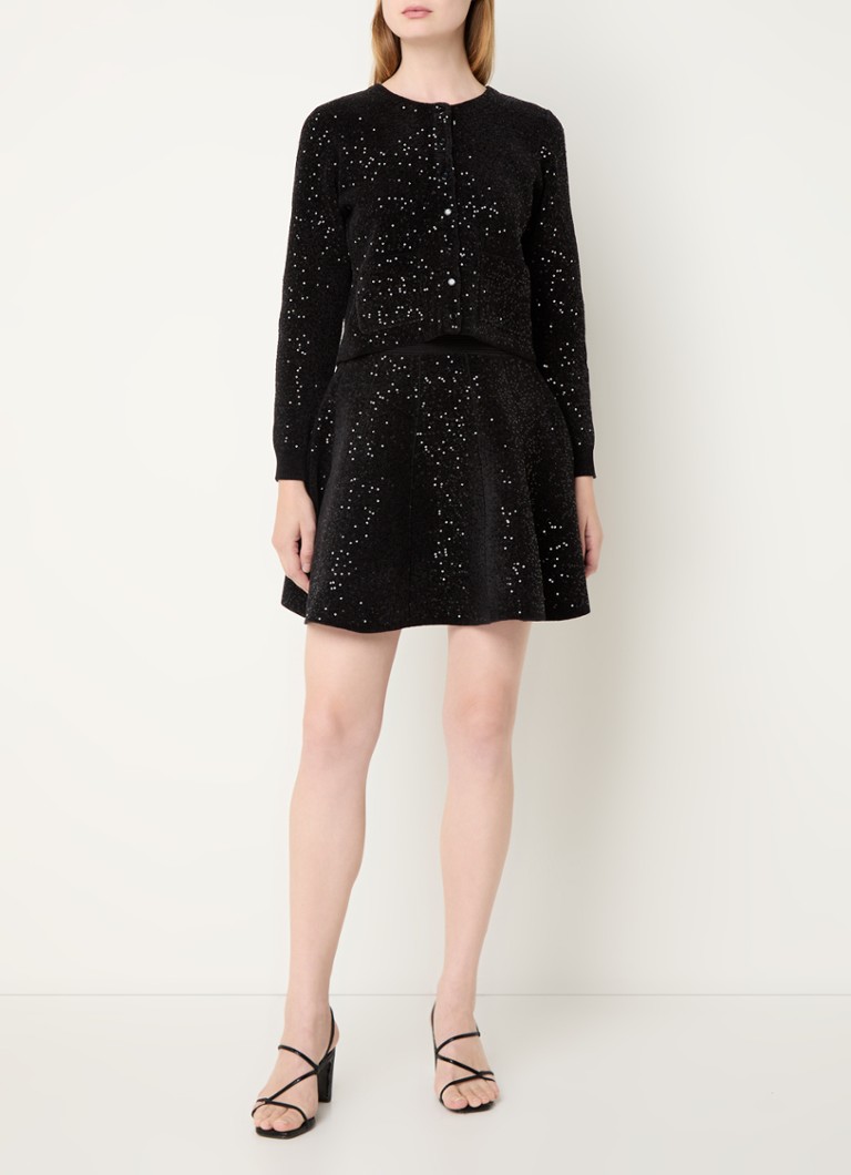 Gilet Sandro in maglia fine impreziosito da paillettes e tasche applicate.