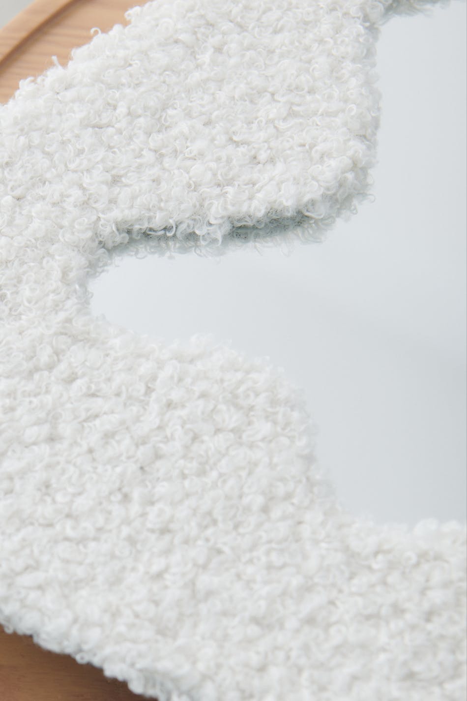 Tufted mirror