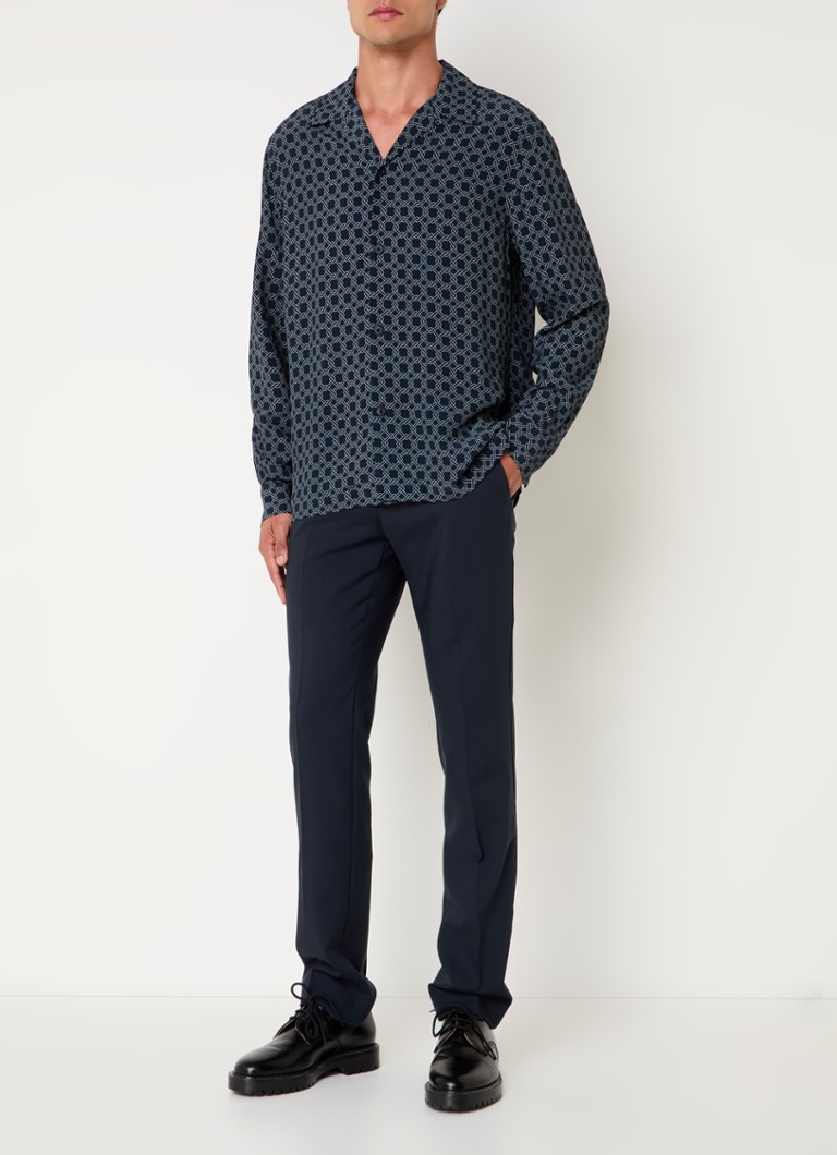 Pantaloni Sandro slim fit din lână virgină, cu buzunare laterale.