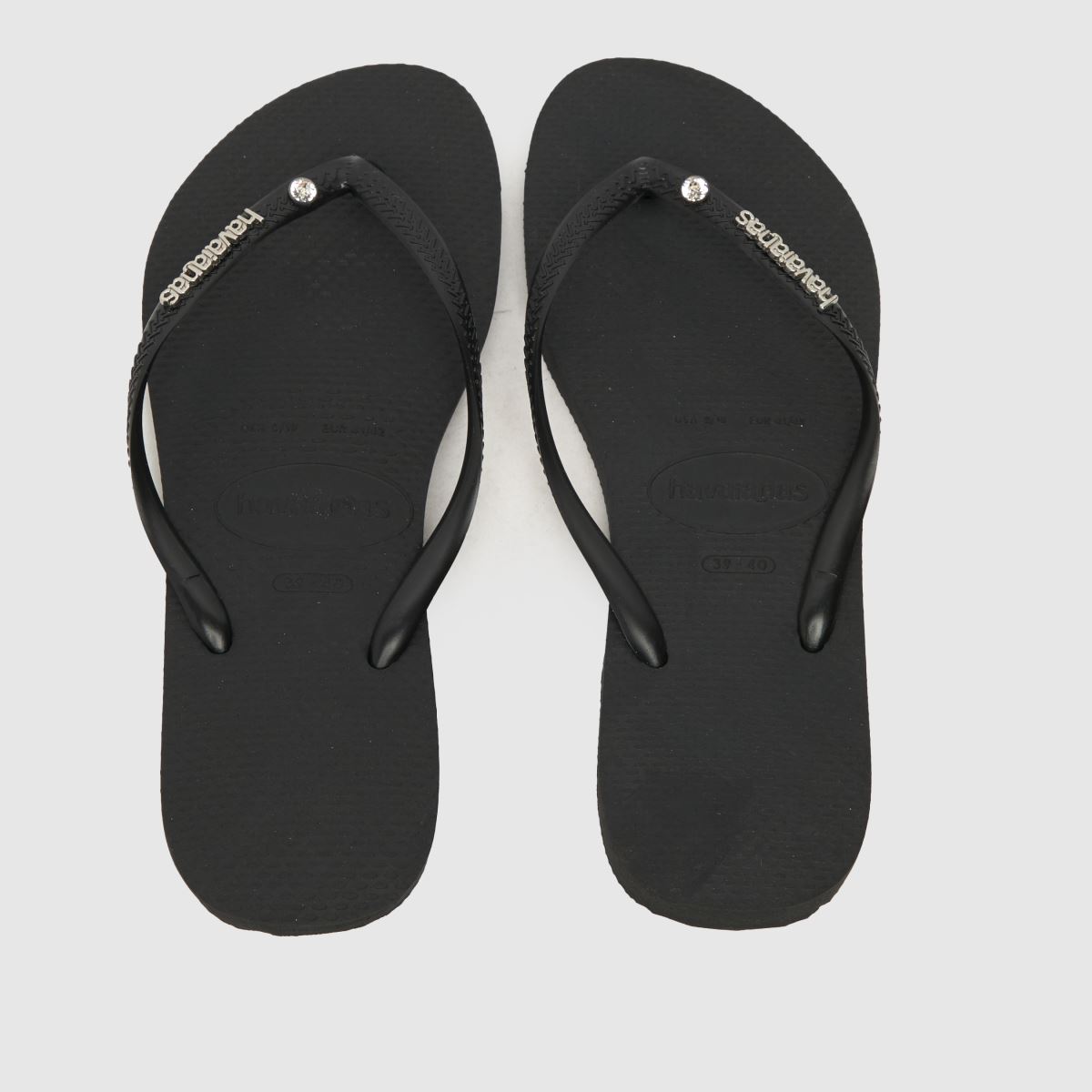 Havaianas – Svarta smala sandaler med metalllogotyp och kristaller