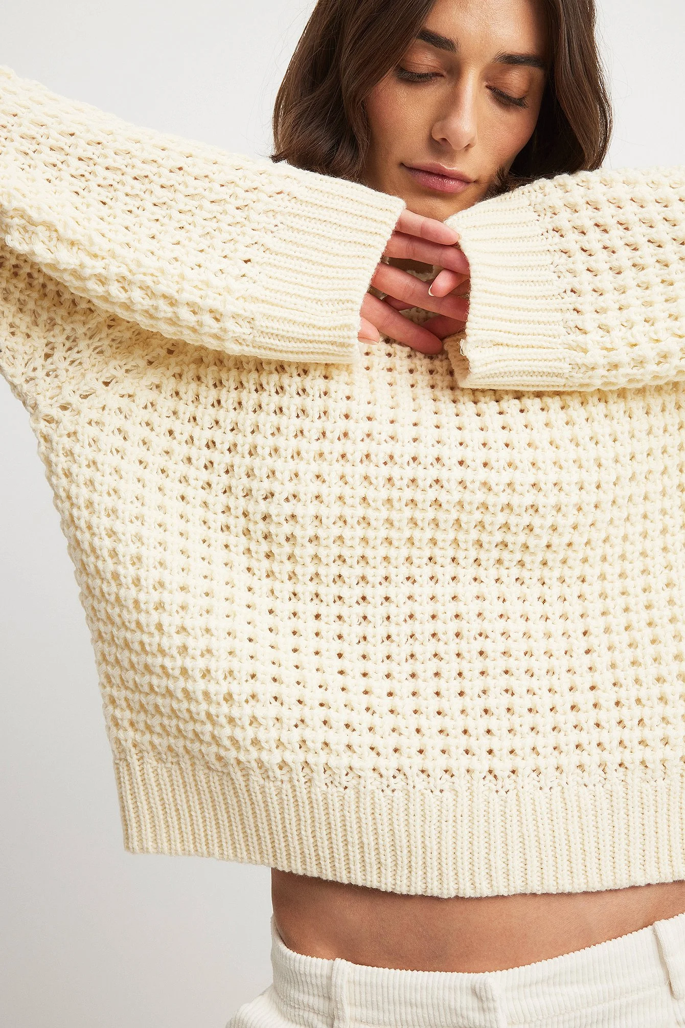 Rundhalsausschnitt Strickpullover