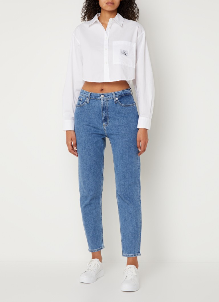Jeans mom fit a vita alta e taglio cropped di Calvin Klein, lavaggio medio.