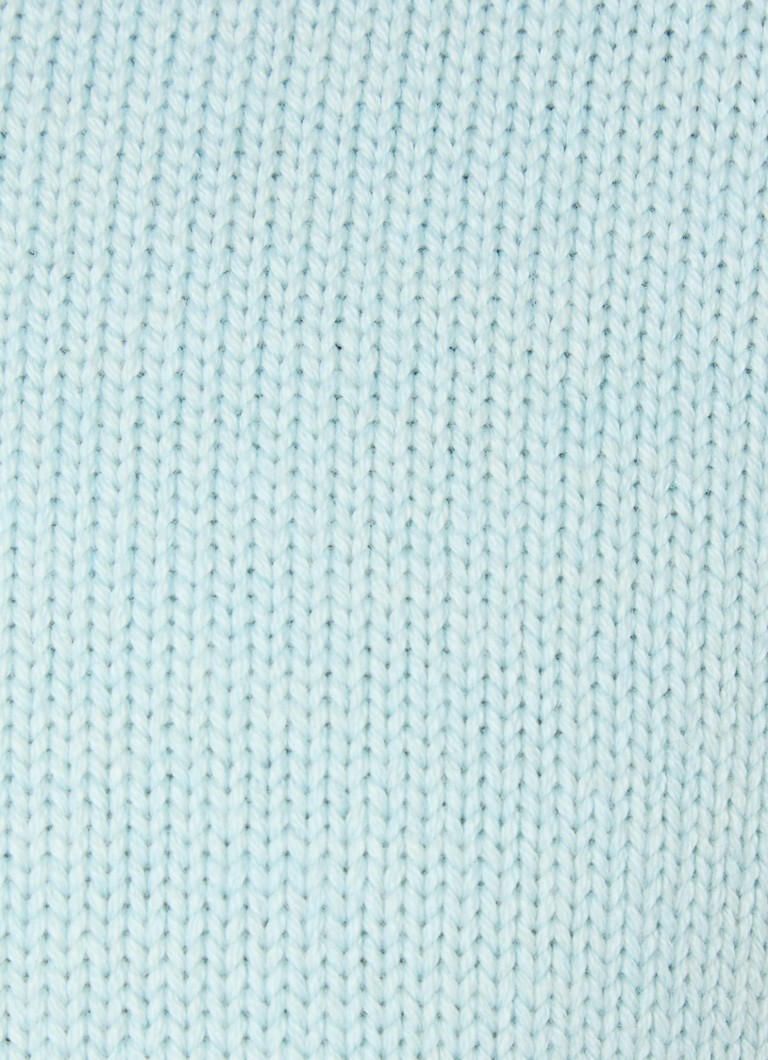 O vază interesantă din amestec de lână cu broderie, realizată din lână groasă de Mr. Knit.