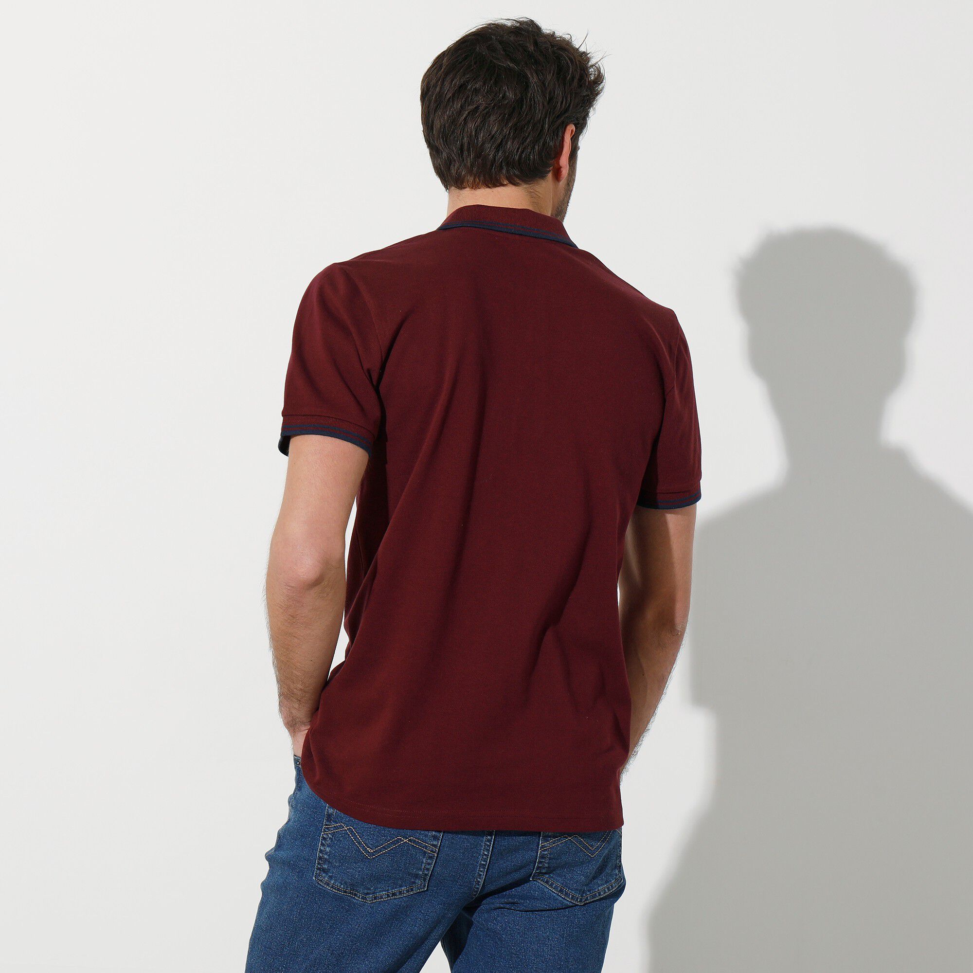 Polo uni maille piquée manches courtes