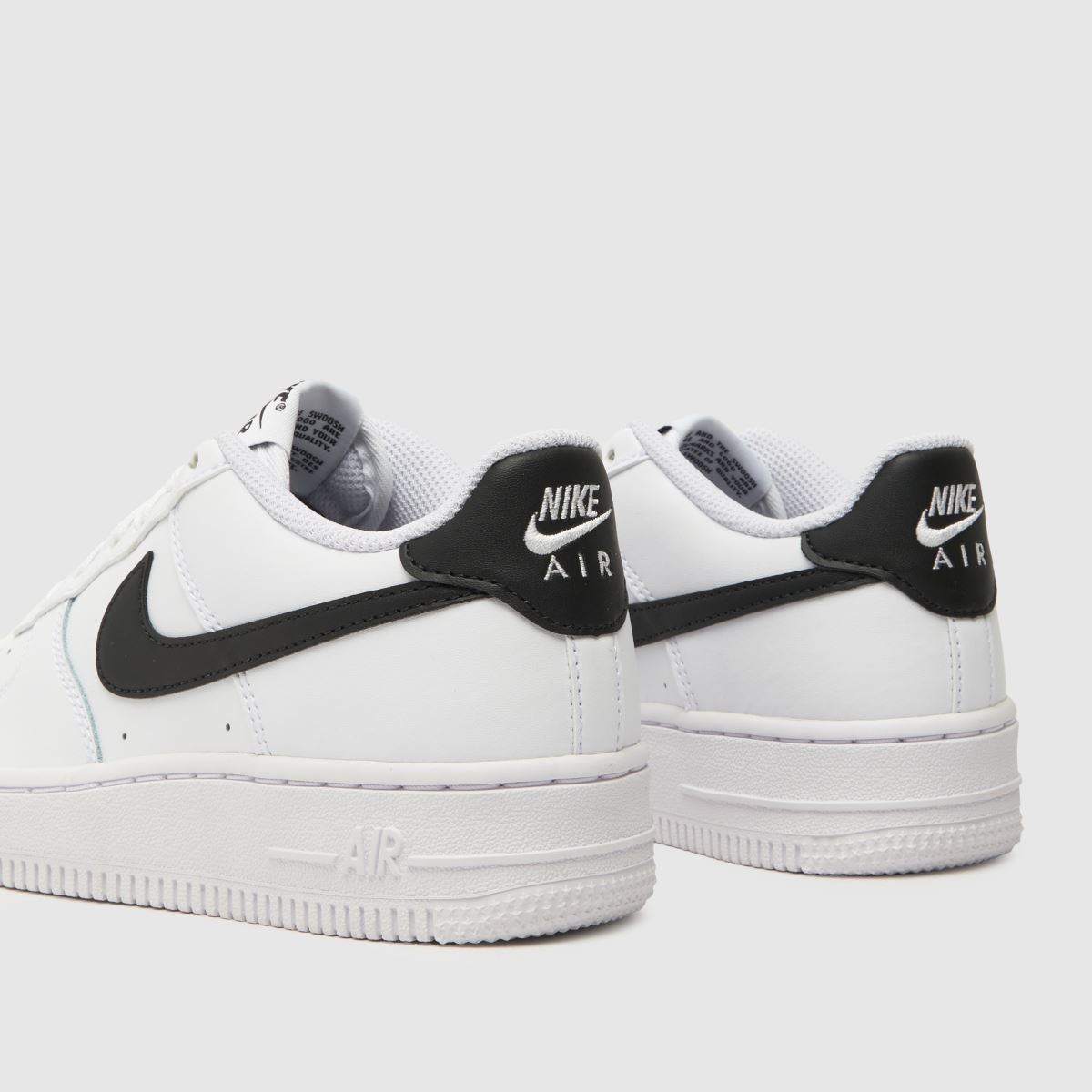 Nike vita och svarta Air Force 1 ungdomsskor