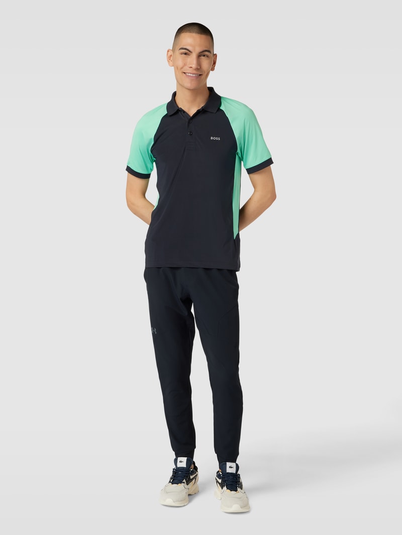 Poloshirt mit Label-Detail Modell 'Pauletech' in marineblau