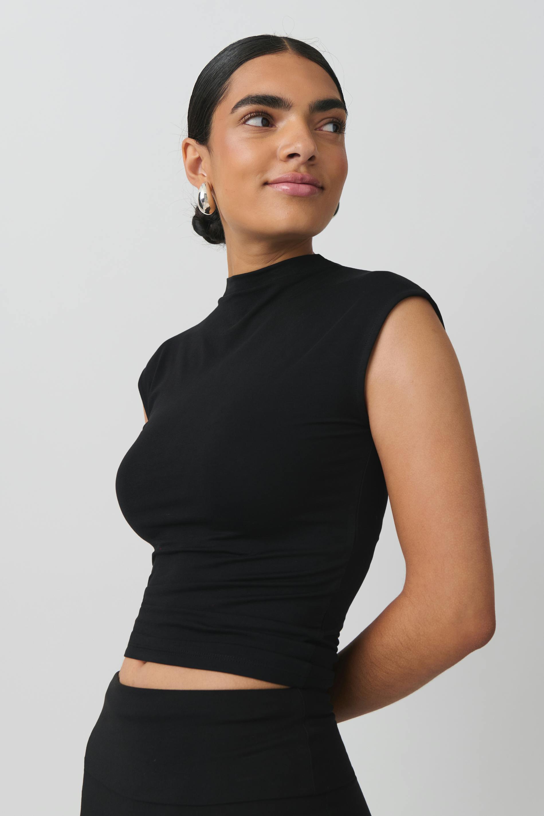 Soft touch funnel neck top