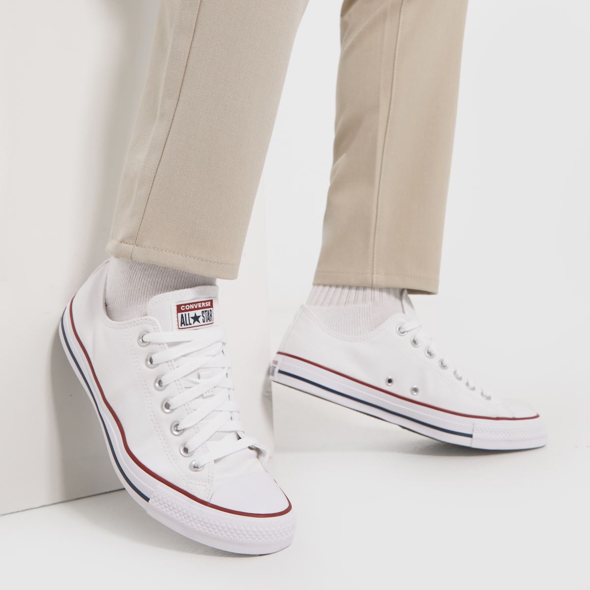 Converse – All Star – Vita sneakers med oxmönster