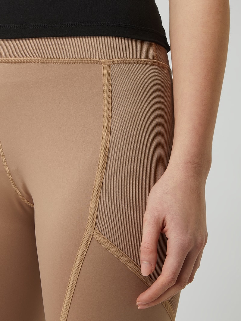 Sportleggings mit Logo-Detail in beige