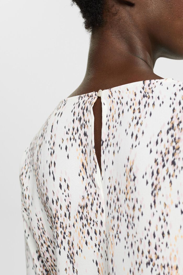 Gemusterte Bluse mit Cut-Out-Detail