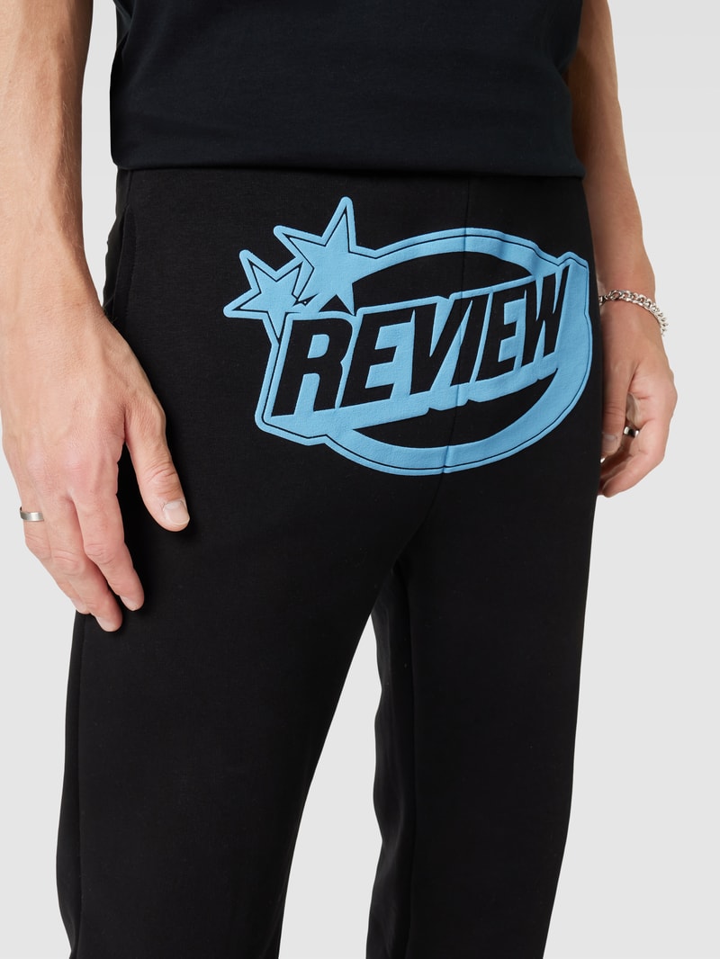 Sweatpants mit Label-Print in schwarz