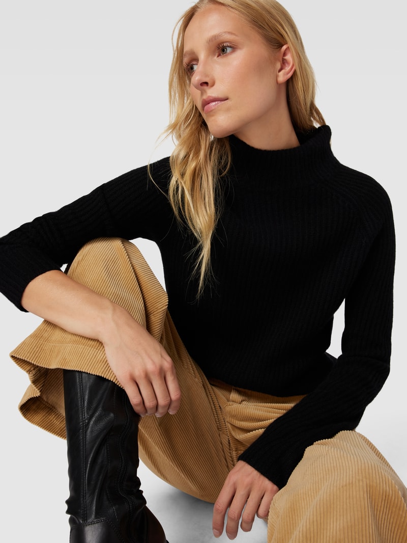 Rollkragenpullover aus Kaschmir mit Rippenstruktur in schwarz