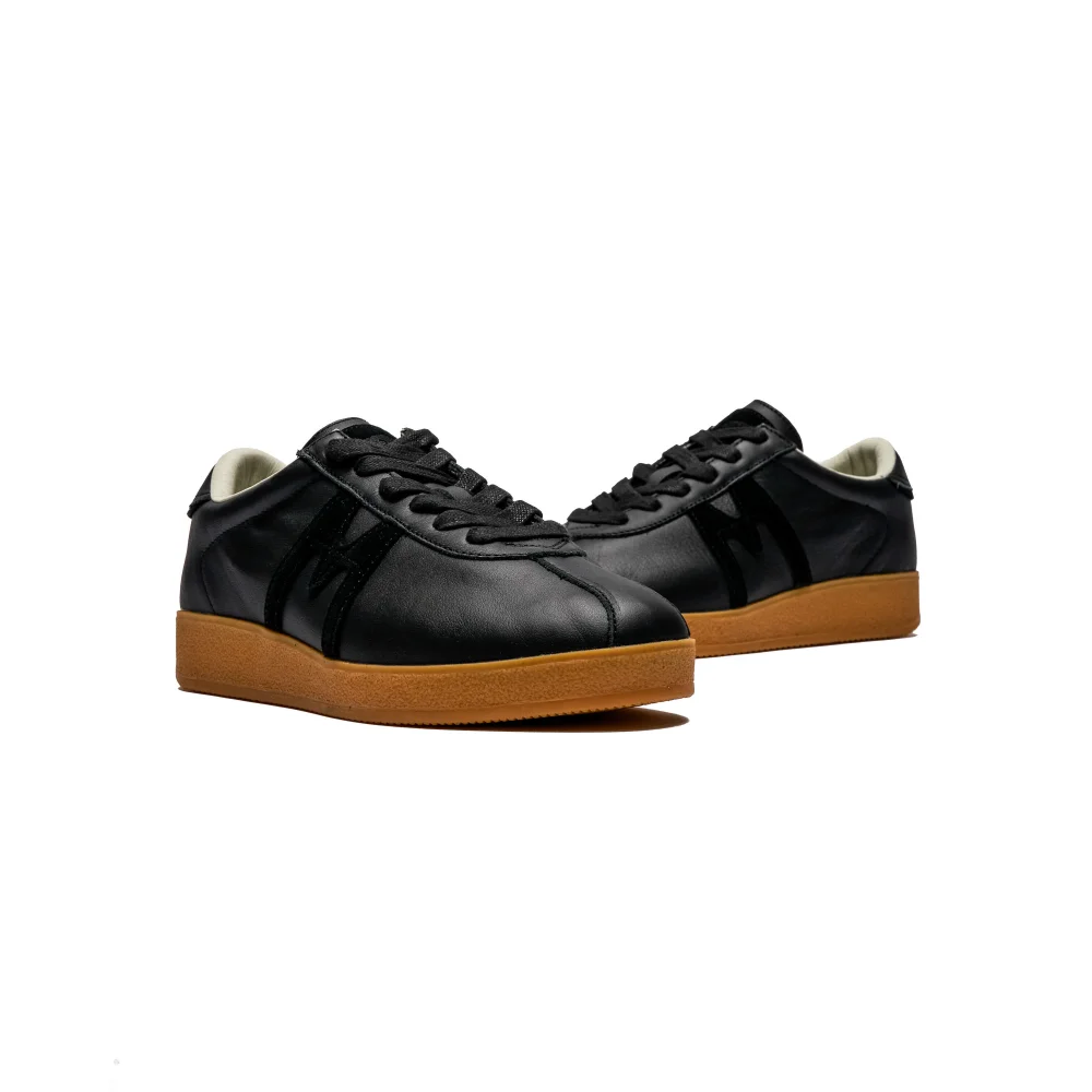 Karhu Trampas F809036 / schwarz