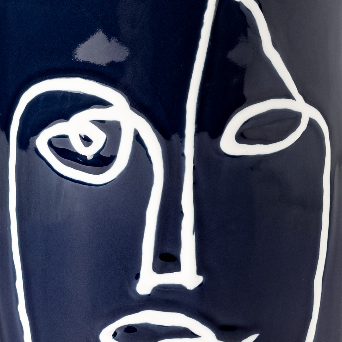 Vase mit abstraktem Gesicht
