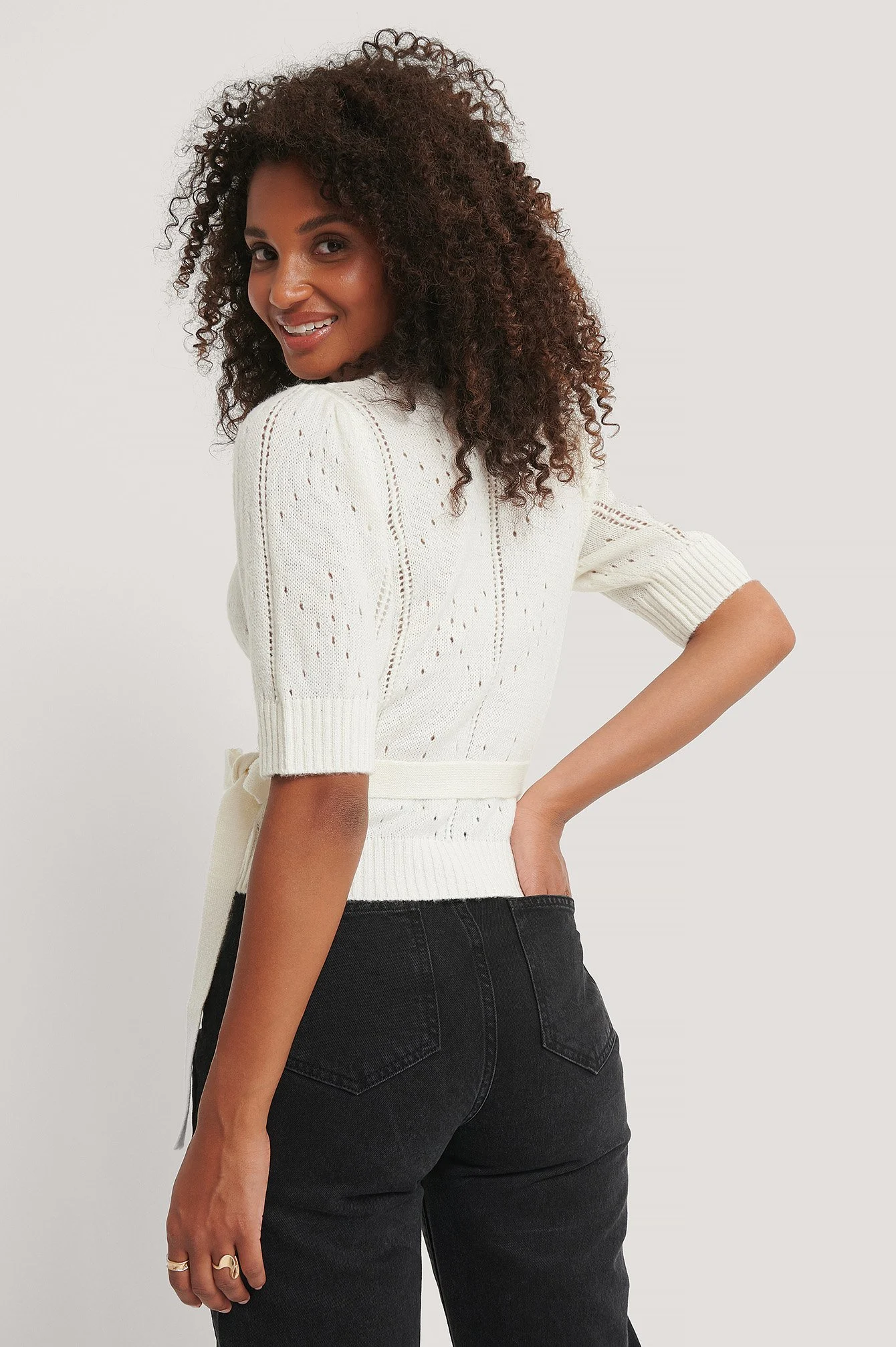 Gemusterter Wickel-Strickpullover