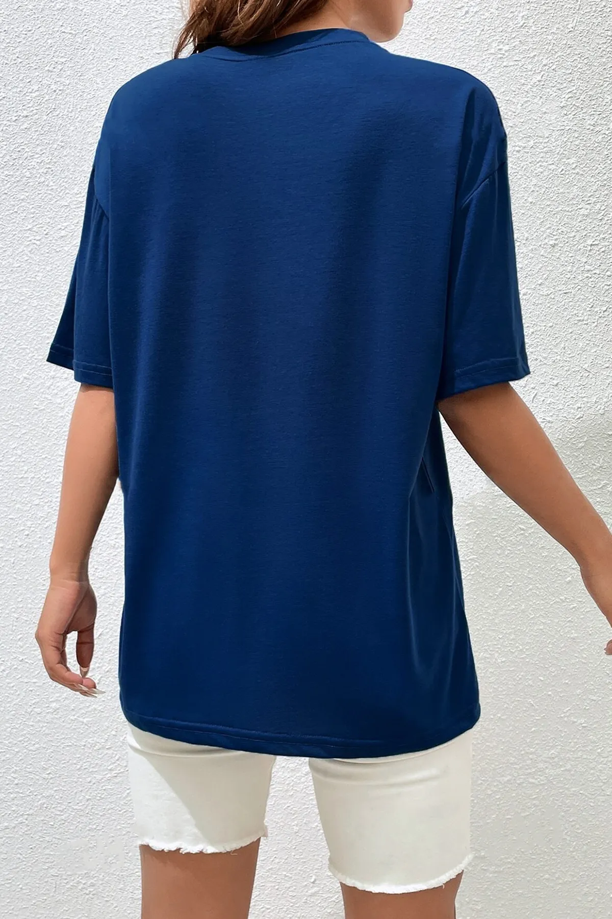 uyguntarz  T-Shirt mit grünem Engel-Print