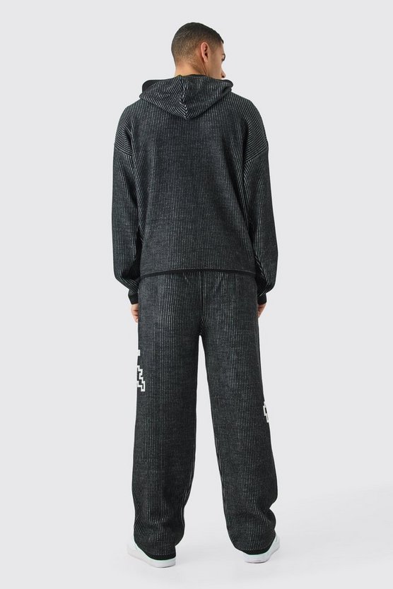 Lockere gerippte Jogginghose mit Palmen-Print