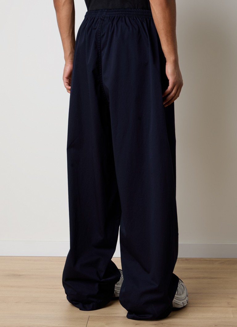 Pantaloni Balenciaga cu croi larg și buzunare laterale